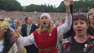 Tens of thousands of Estonians perform mass folk singing [upl. by Aikehs]